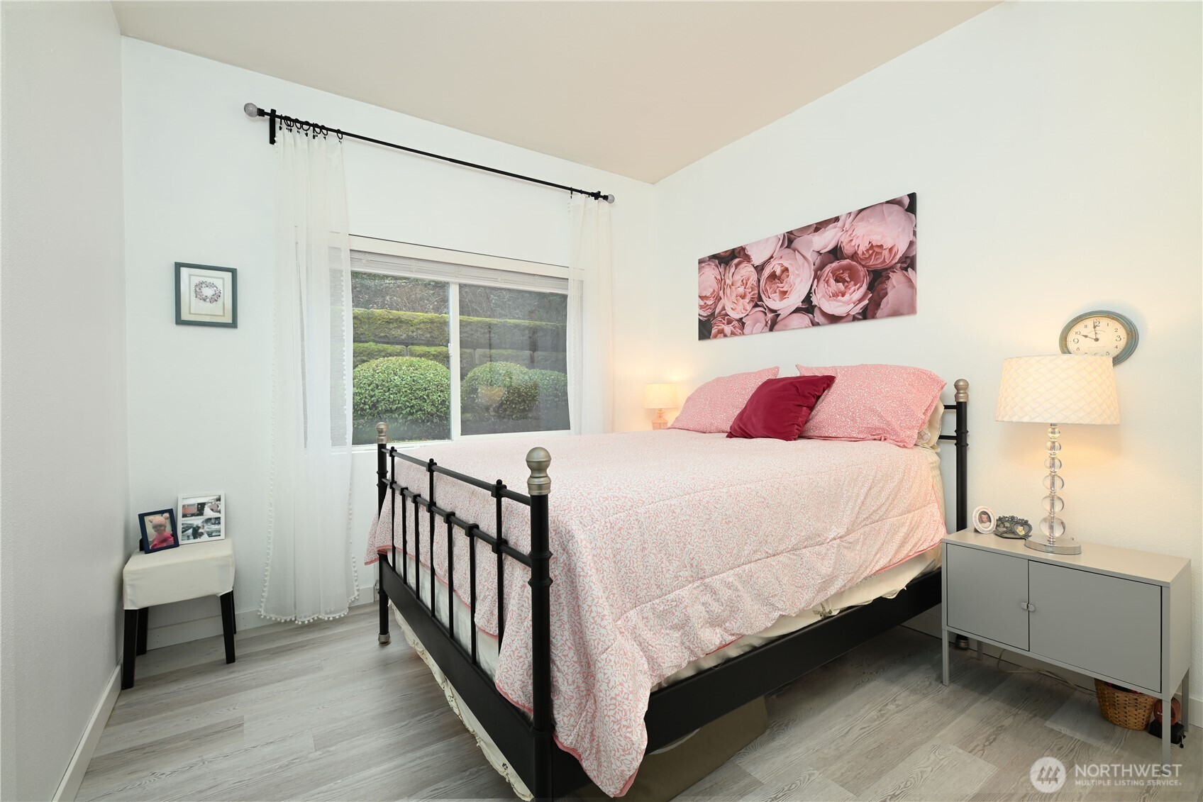 17761 134th Lane Southeast Renton, WA 98058 - Photo 17 of 38 a bedroom with a bed and a large window