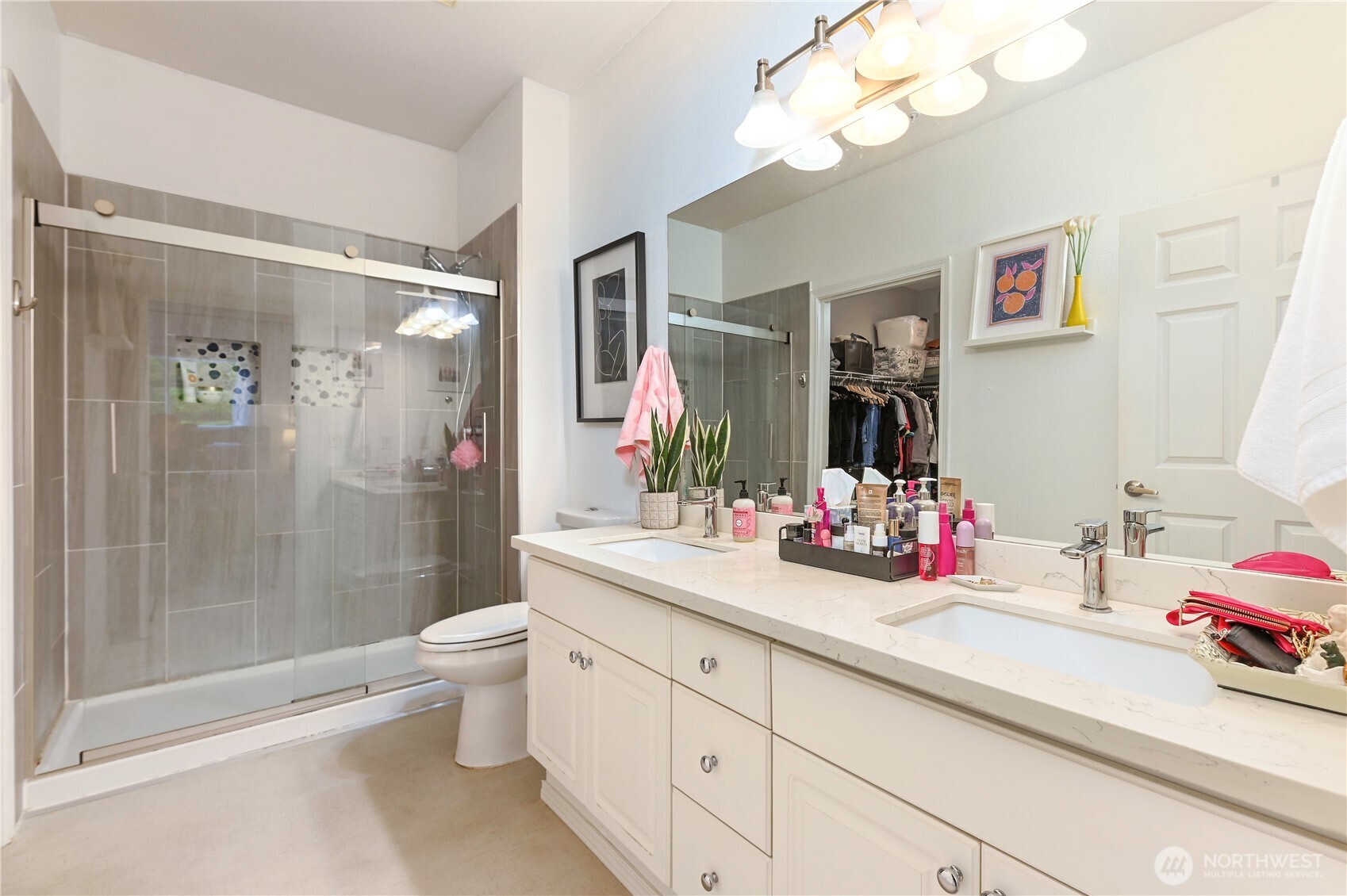 17761 134th Lane Southeast Renton, WA 98058 - Photo 21 of 38 a bathroom with a double vanity sink mirror and toilet