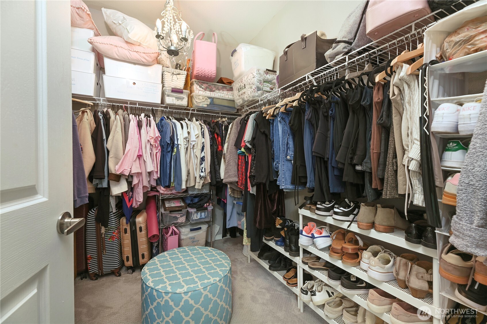 17761 134th Lane Southeast Renton, WA 98058 - Photo 24 of 38 a view of walk in closet with clothes