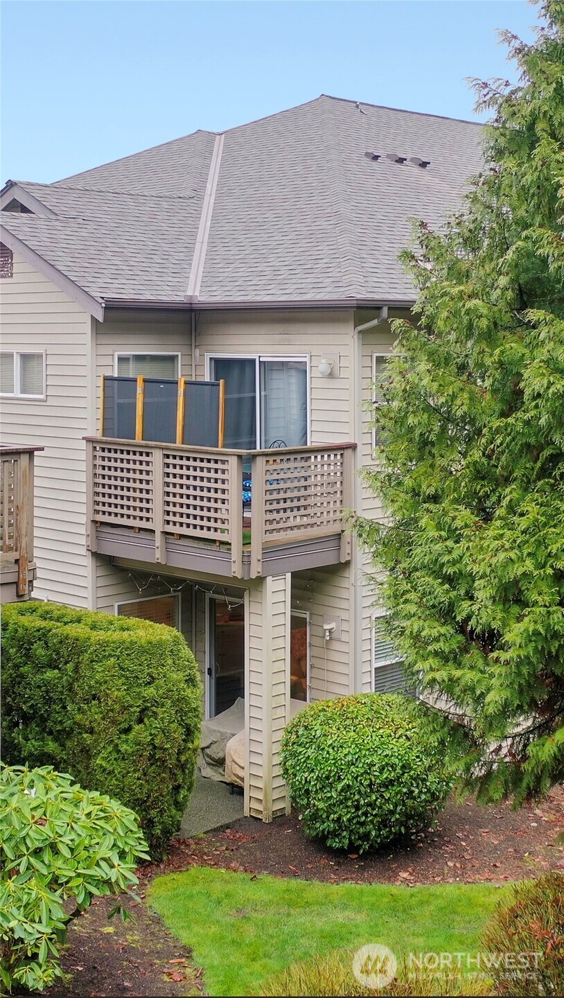 17761 134th Lane Southeast Renton, WA 98058 - Photo 27 of 38 a front view of a house with a garden