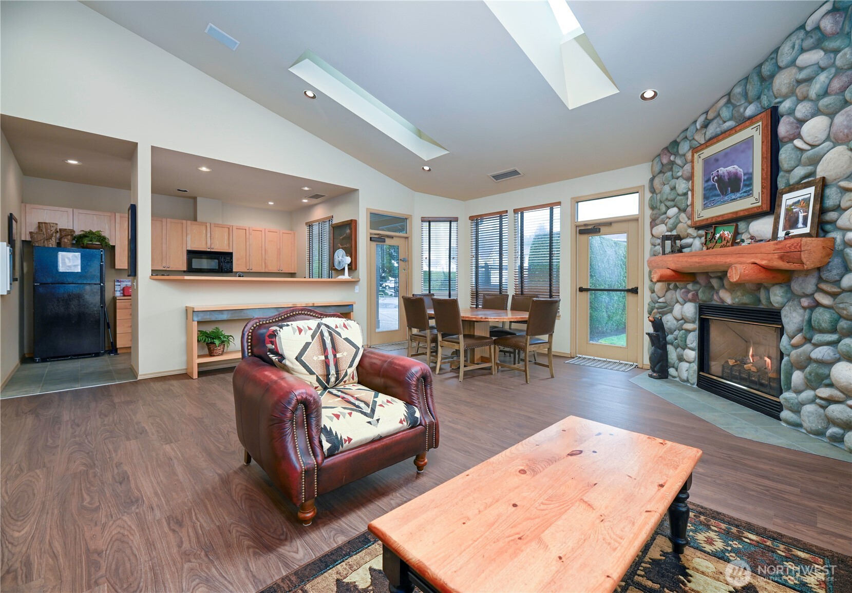 17761 134th Lane Southeast Renton, WA 98058 - Photo 33 of 38 a living room with furniture and a fireplace