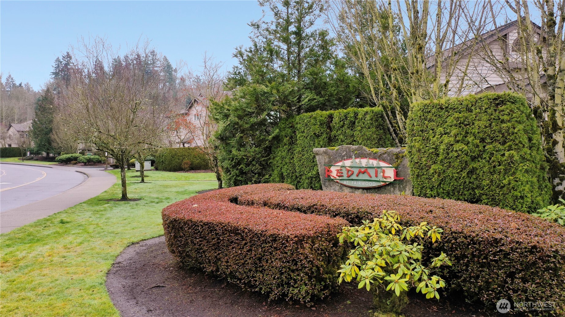 17761 134th Lane Southeast Renton, WA 98058 - Photo 4 of 38 a sign board with a garden
