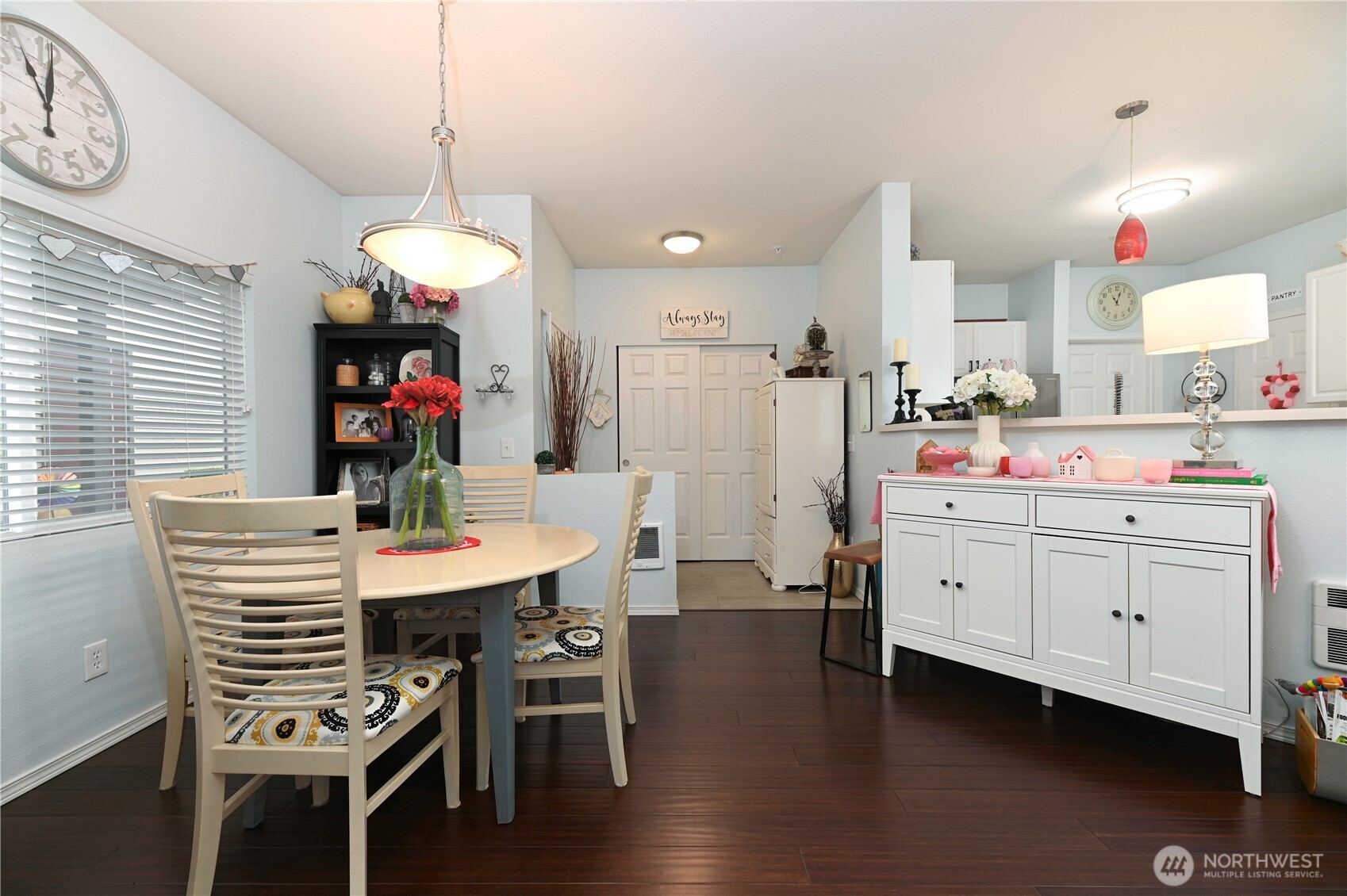 17761 134th Lane Southeast Renton, WA 98058 - Photo 6 of 38 a kitchen that has a table and chairs in it