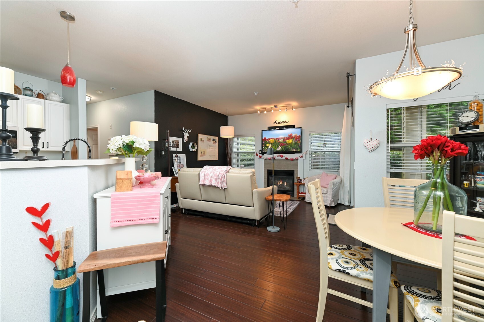 17761 134th Lane Southeast Renton, WA 98058 - Photo 7 of 38 a living room with furniture and a table