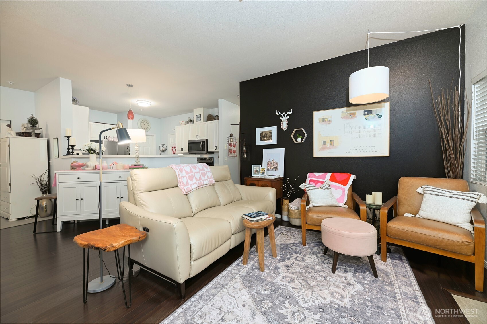 17761 134th Lane Southeast Renton, WA 98058 - Photo 9 of 38 a living room with furniture and a rug