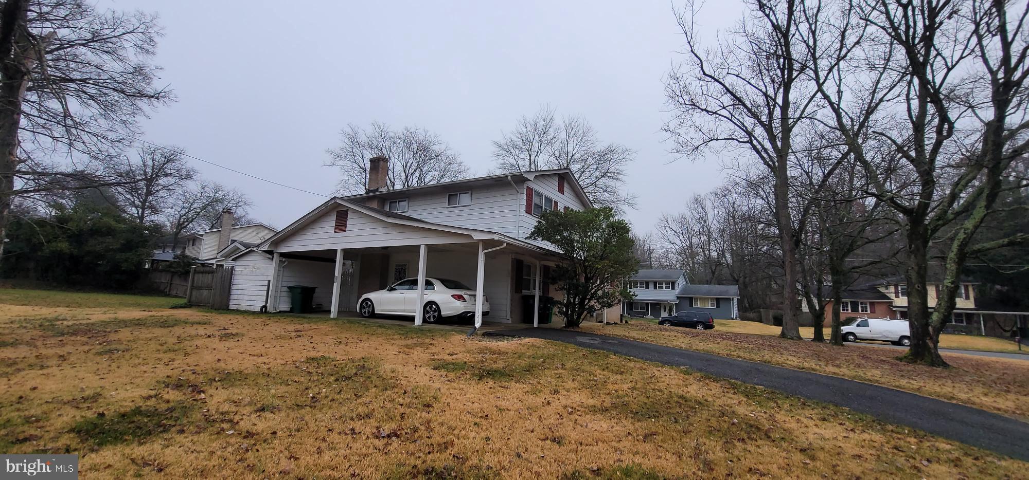 4605 Sharon Road Temple Hills, MD 20748 - Photo 2 of 19 a view of a house with a snow on the road