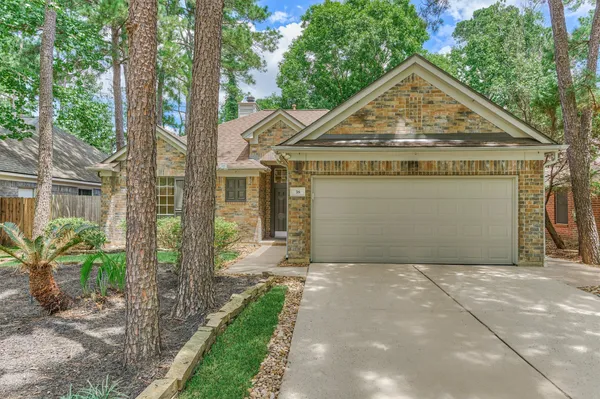 $325,000 | 38 Tranquil Glade Place, The Woodlands, TX 77381