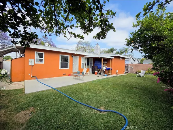 a front view of a house with yard