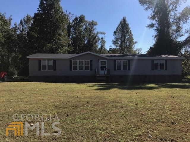17052 State Rte 119C Brooklet, GA 30415 - Photo 1 of 1 a view of a house with a yard