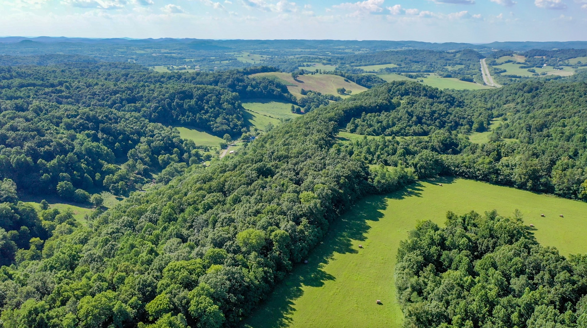 0 Crews Hollow Road Manchester, TN 37355 - Photo 16 of 17 an aerial view of a house with a garden and lake view