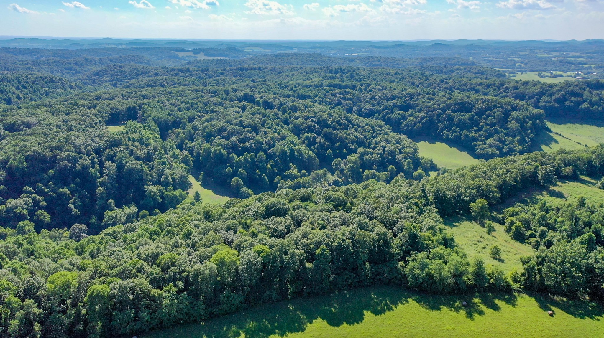 0 Crews Hollow Road Manchester, TN 37355 - Photo 2 of 17 an aerial view of residential house with outdoor space and trees all around