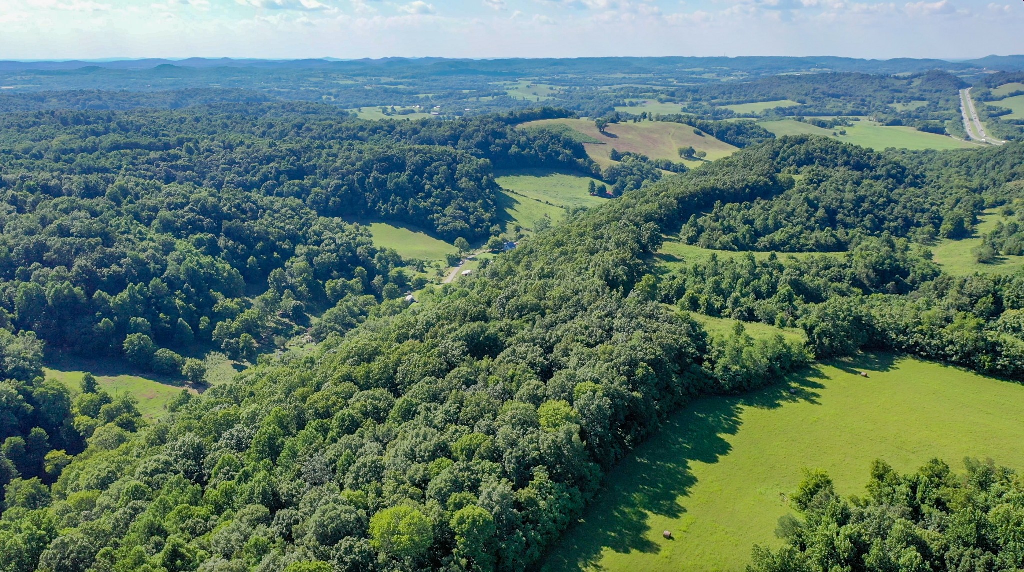0 Crews Hollow Road Manchester, TN 37355 - Photo 10 of 17 an aerial view of a house with a yard