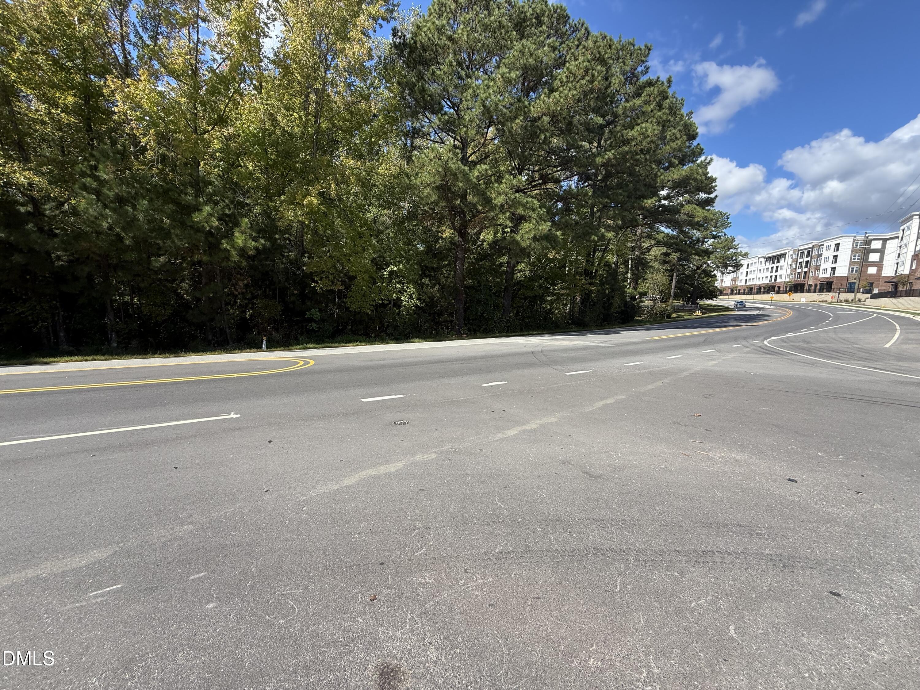 4724 Sunset Lake Road Apex, NC 27539 - Photo 5 of 6 a view of parking space with city view