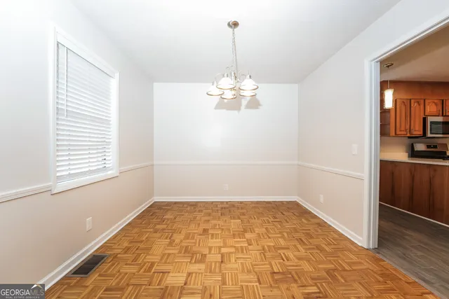 a view of a room with a window