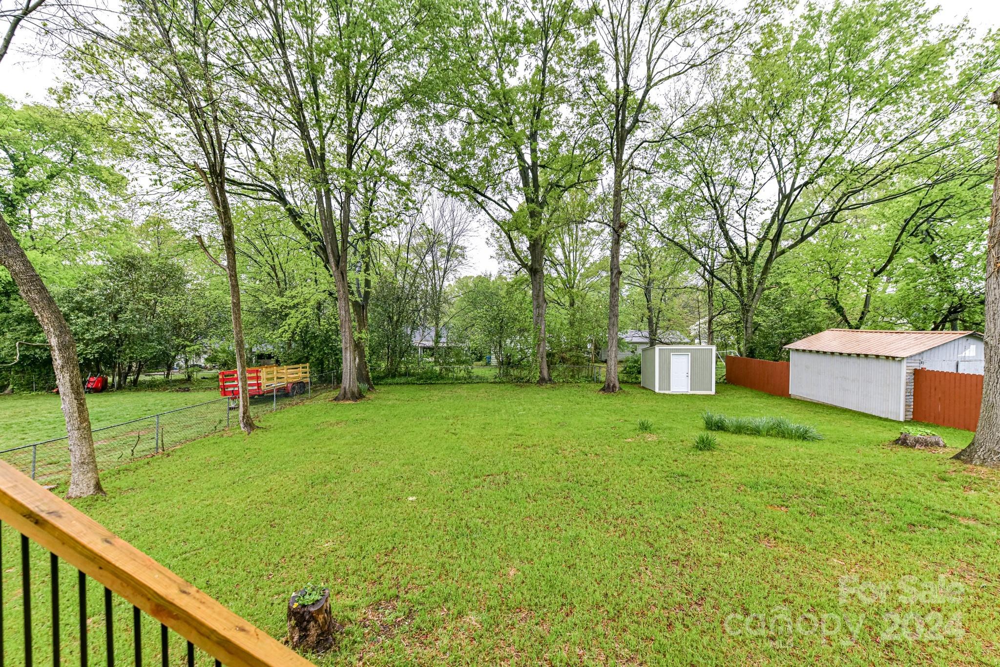136 Spencer Avenue Northwest Concord, NC 28025 - Photo 33 of 43 a garden view