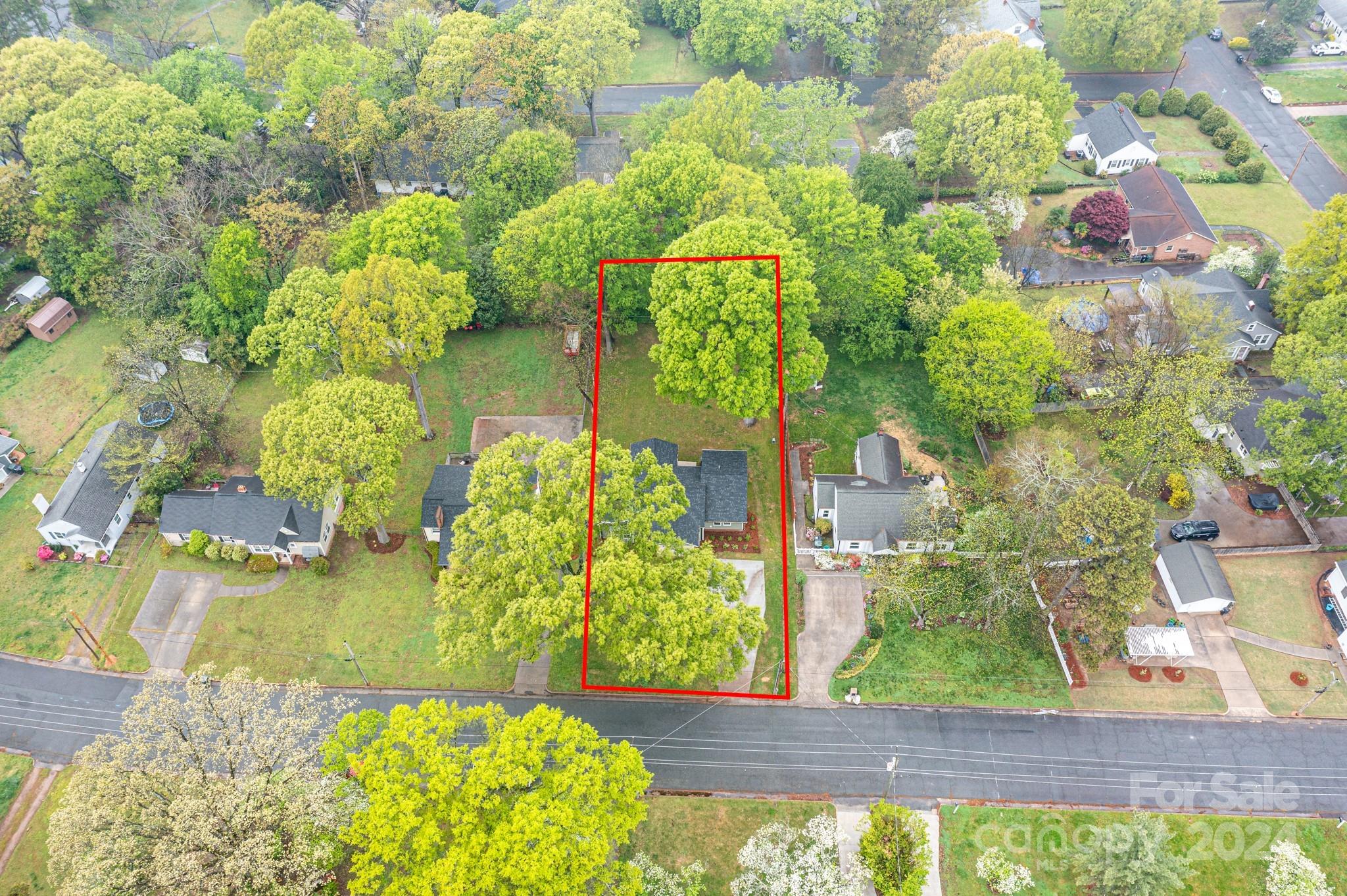 136 Spencer Avenue Northwest Concord, NC 28025 - Photo 36 of 43 a view of a garden