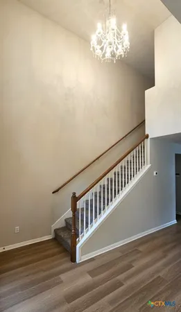 a view of entryway with wooden floor