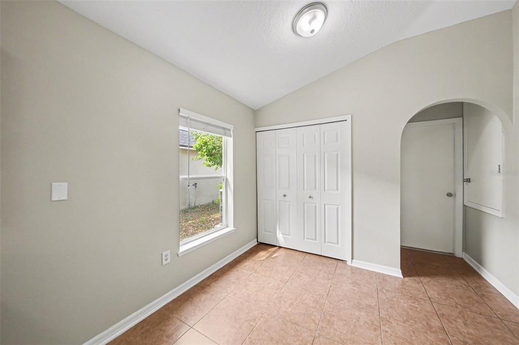 2212 Nicollett Way Leesburg, FL 34748 - Photo 16 of 26 a view of an empty room and window