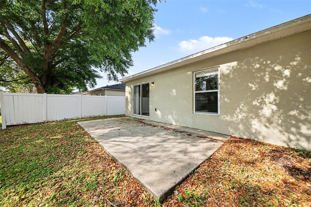2212 Nicollett Way Leesburg, FL 34748 - Photo 25 of 26 a view of backyard of the house