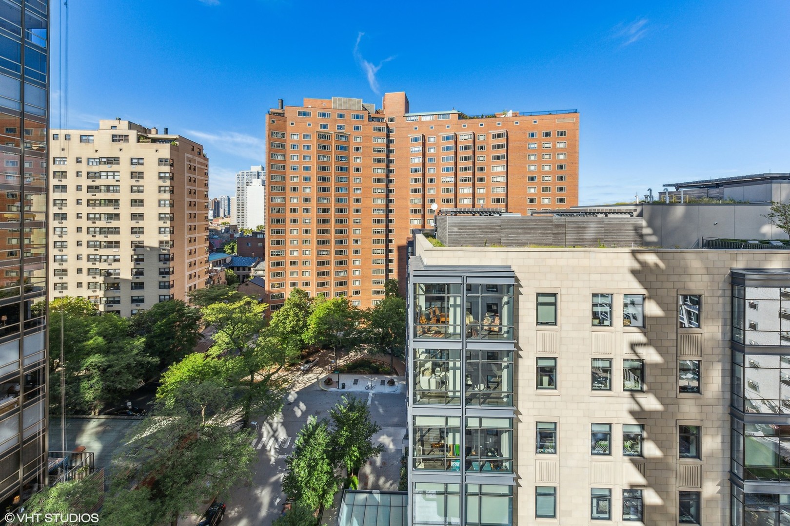 1313 North Ritchie Court, Unit 1304 Chicago, IL 60610 - Photo 17 of 20 a view of a building with a yard