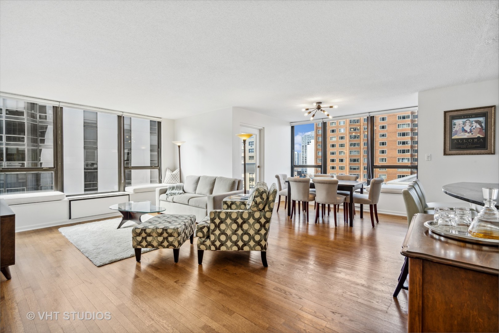 1313 North Ritchie Court, Unit 1304 Chicago, IL 60610 - Photo 2 of 20 a living room with furniture and wooden floor