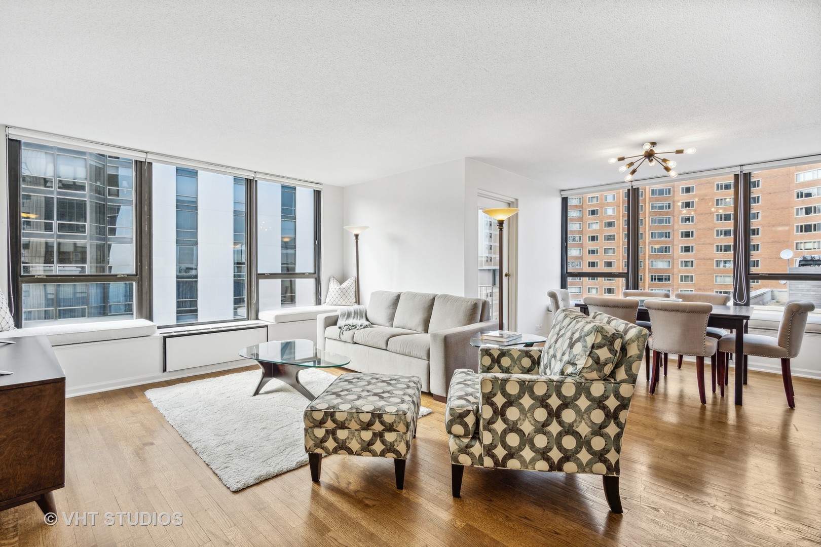 1313 North Ritchie Court, Unit 1304 Chicago, IL 60610 - Photo 3 of 20 a living room with furniture and a large window