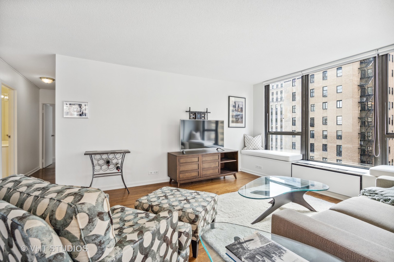 1313 North Ritchie Court, Unit 1304 Chicago, IL 60610 - Photo 7 of 20 a bedroom with furniture and a large window