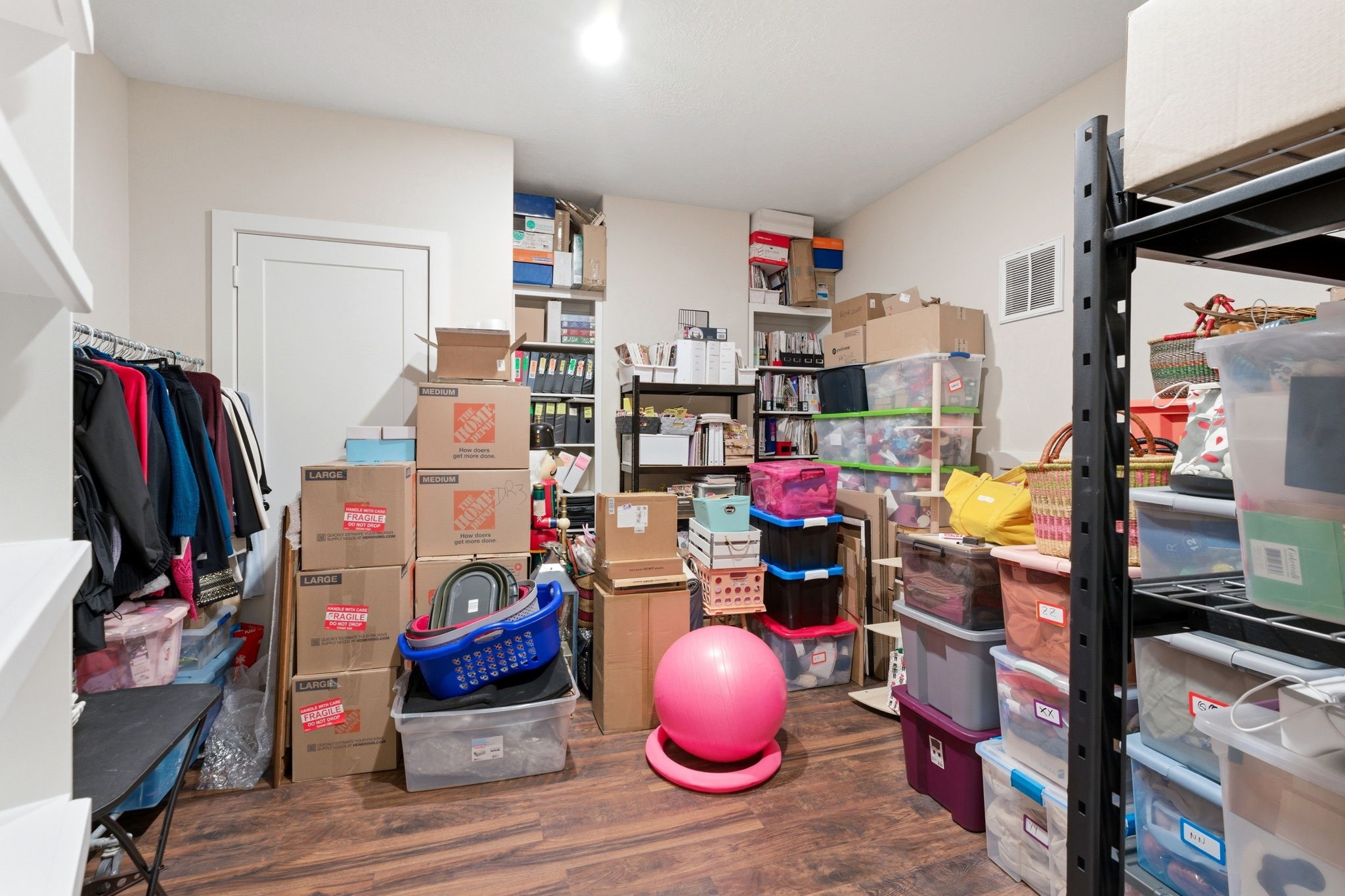 280 Sundog Road Huntsville, TX 77340 - Photo 39 of 50 Air-conditioned 15 x 15 bonus room located upstairs, ideal for storage, hobbies, or additional flexible living space.