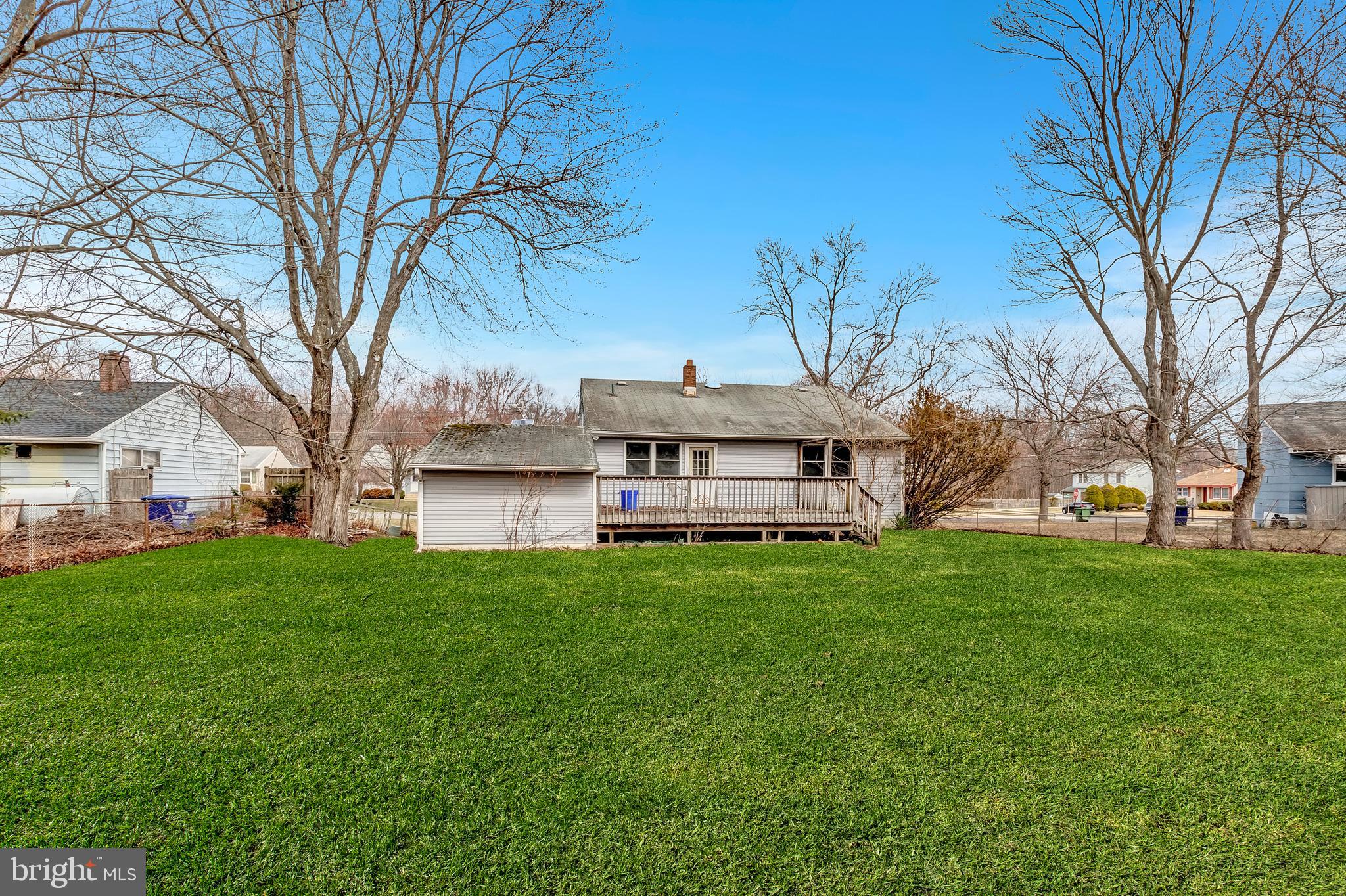 63 Baker Boulevard Marlton, NJ 08053 - Photo 9 of 10 a view of a yard in front of a house