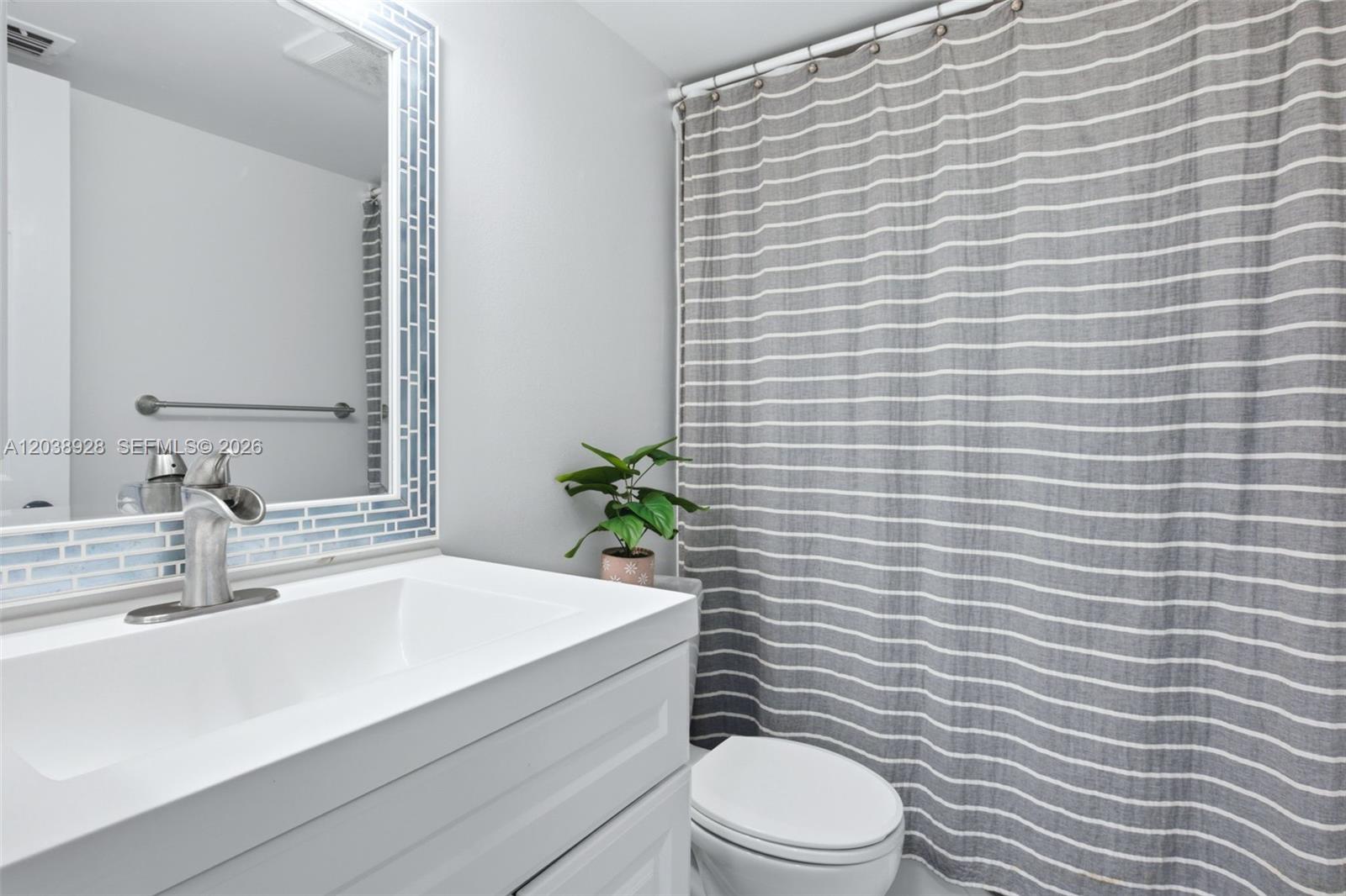 6800 Cypress Road, Unit 201 Plantation, FL 33317 - Photo 23 of 27 Guest bathroom