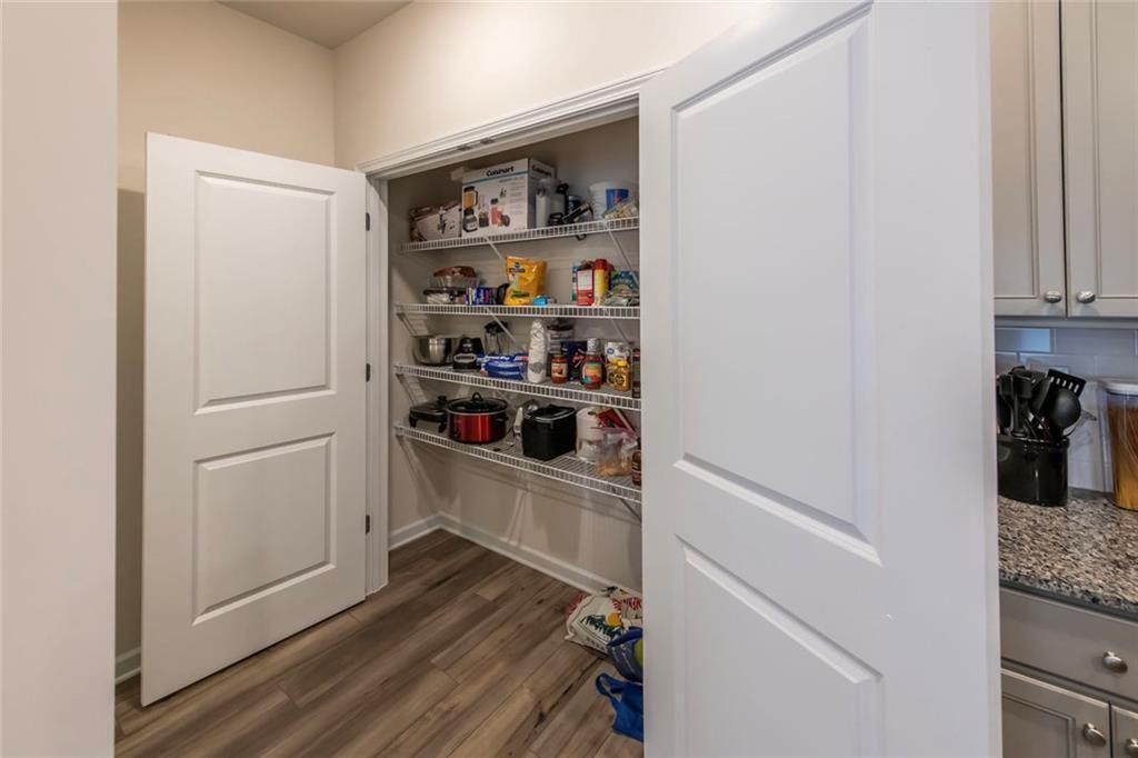 1182 Westhampton Way Villa Rica, GA 30180 - Photo 12 of 26 a view of refrigerator and cabinets