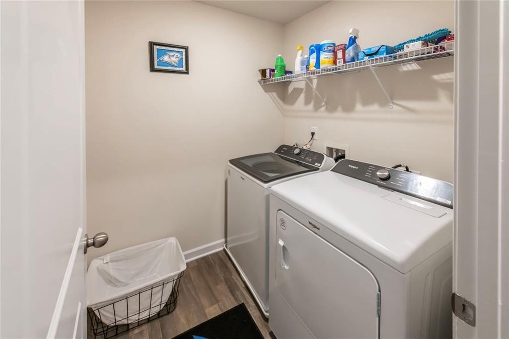 1182 Westhampton Way Villa Rica, GA 30180 - Photo 17 of 26 a utility room with dryer and washer