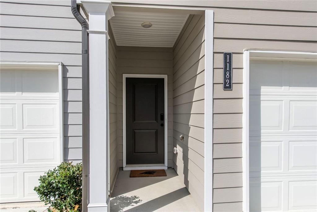 1182 Westhampton Way Villa Rica, GA 30180 - Photo 2 of 26 a view of front door