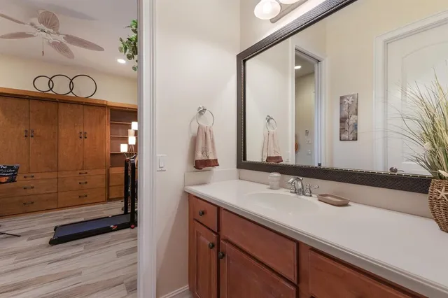 a lobby with furniture and a rug
