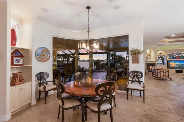 a kitchen with a stove and a clock on the wall