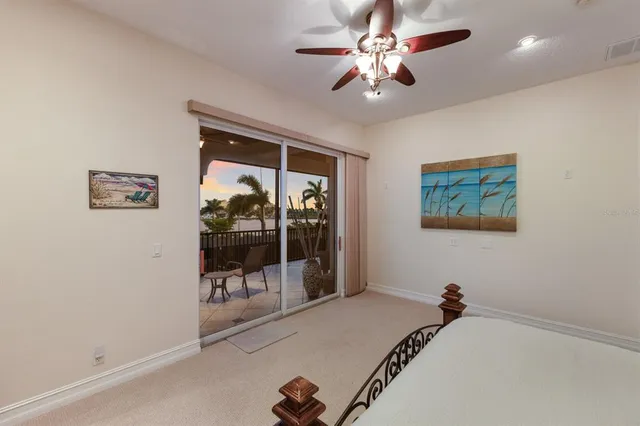 an aerial view of a house with a ocean view