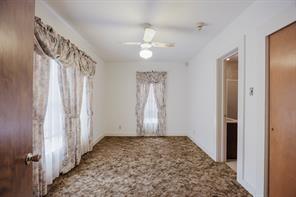 1717 Pipeline Road Cleburne, TX 76033 - Photo 14 of 33 Carpeted spare room with ceiling fan