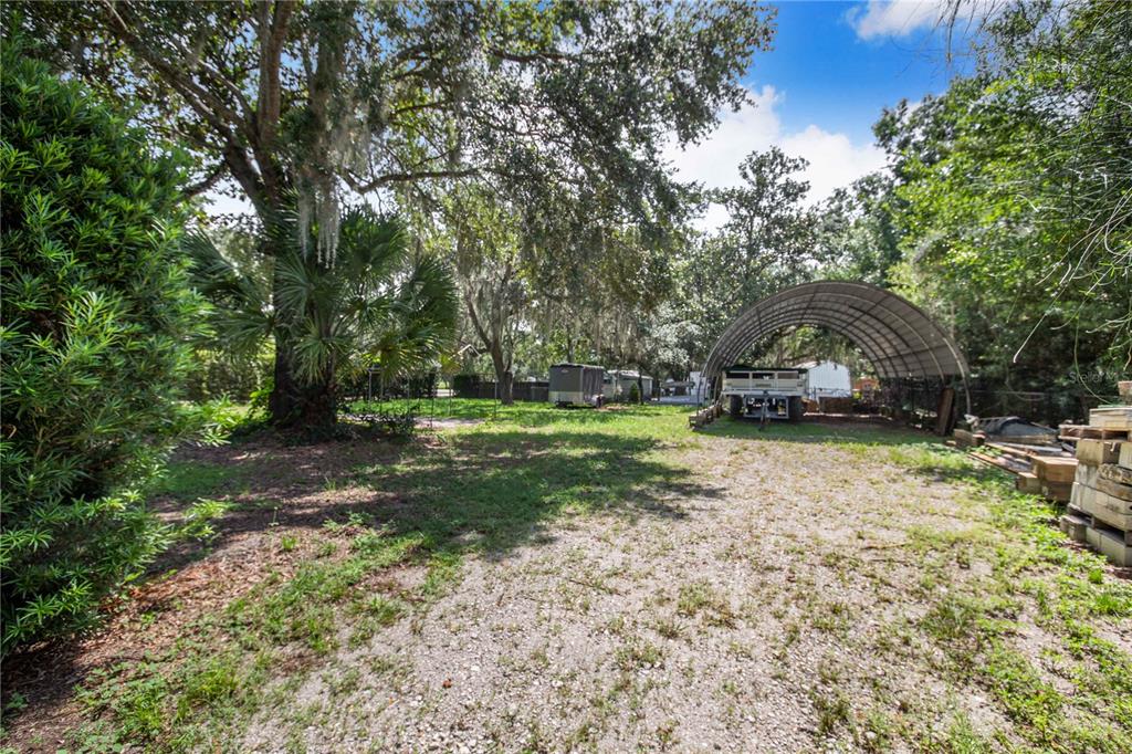 6648 Cherry Pocket Road Lake Wales, FL 33898 - Photo 8 of 12 a view of backyard with green space