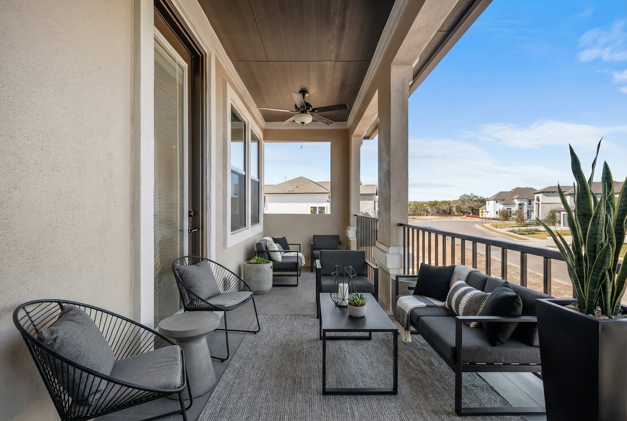 2660 Novara Trail Leander, TX 78641 - Photo 14 of 25 a living room with furniture and a floor to ceiling window