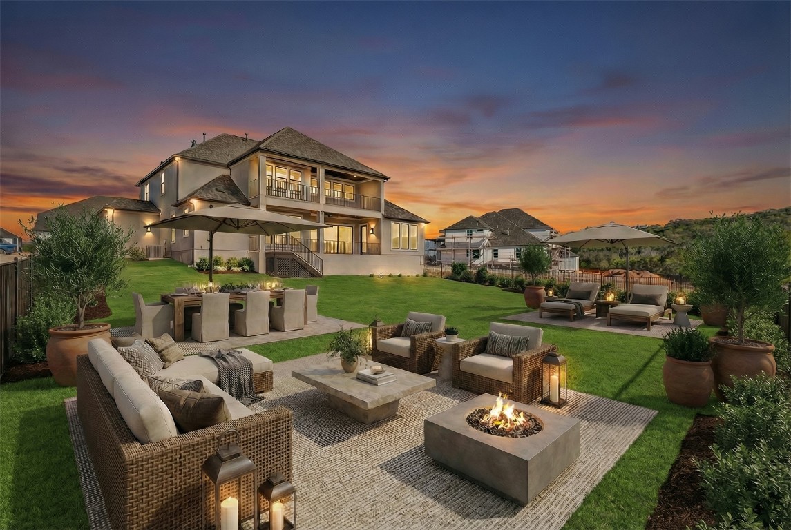 2660 Novara Trail Leander, TX 78641 - Photo 16 of 22 Back of property with outdoor lounge area, a patio area, stairway, a balcony, and a fenced backyard