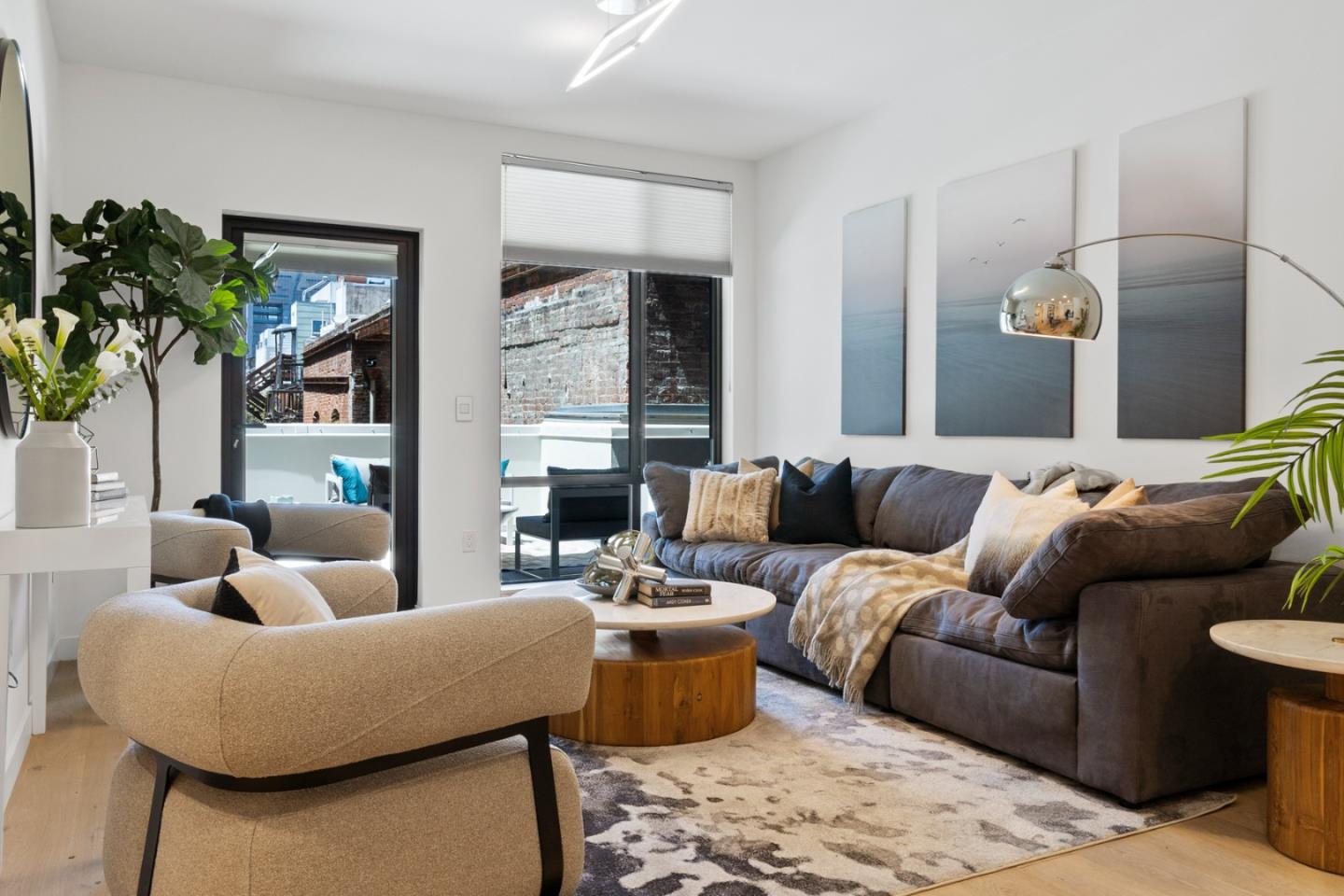 99 Rausch Street, Unit 219 San Francisco, CA 94103 - Photo 13 of 57 a living room with furniture and a potted plant
