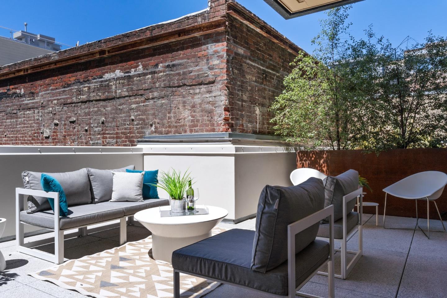 99 Rausch Street, Unit 219 San Francisco, CA 94103 - Photo 33 of 57 a view of a chairs and table in the patio