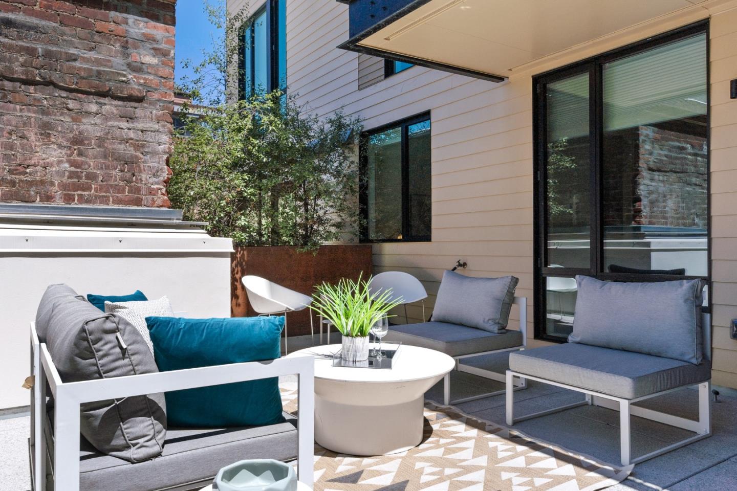 99 Rausch Street, Unit 219 San Francisco, CA 94103 - Photo 4 of 57 a view of backyard of house with seating space