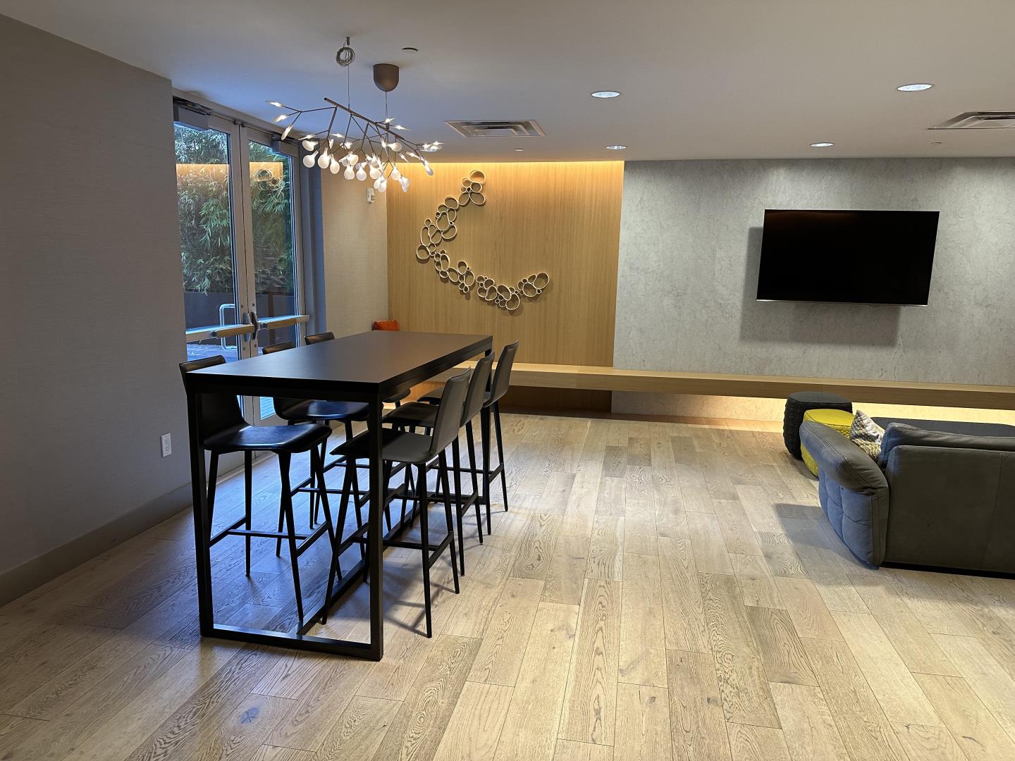 99 Rausch Street, Unit 219 San Francisco, CA 94103 - Photo 43 of 57 a living room with furniture and a flat screen tv