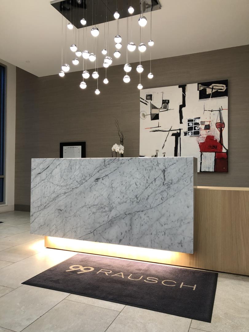 99 Rausch Street, Unit 219 San Francisco, CA 94103 - Photo 49 of 57 a living room with furniture and a chandelier