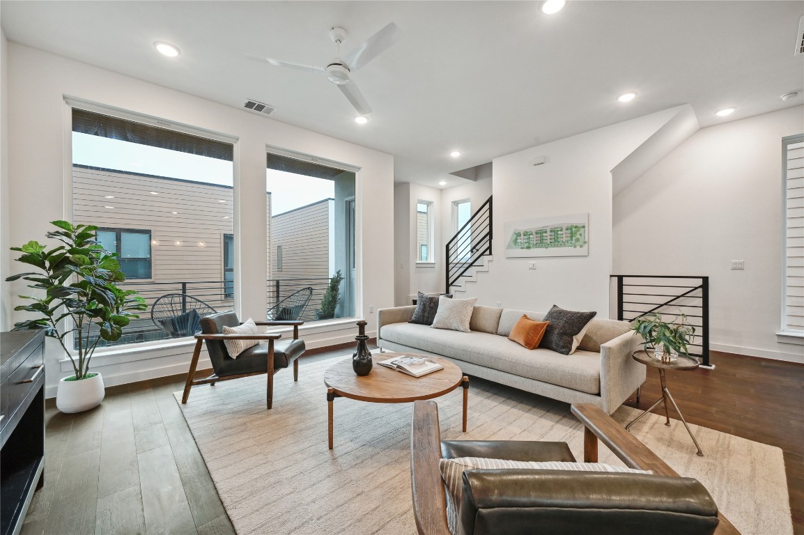 6821 Wolfcreek Pass, Unit 12 Austin, TX 78749 - Photo 12 of 32 a living room with furniture and a potted plant