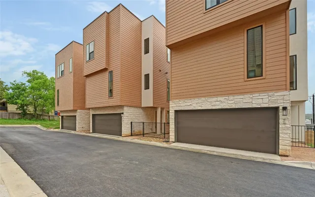 a front view of a house with a garage