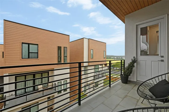 a view of a building from a balcony