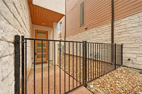 a view of a balcony with a door