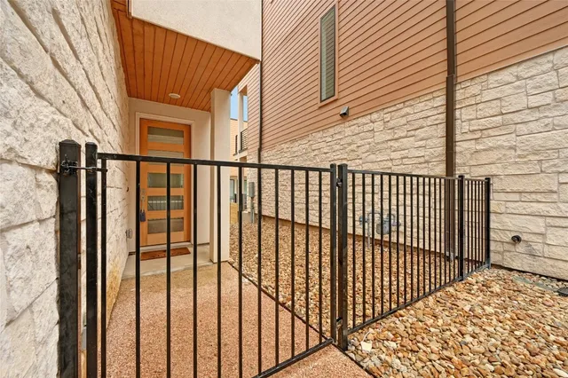 a view of a balcony with a door